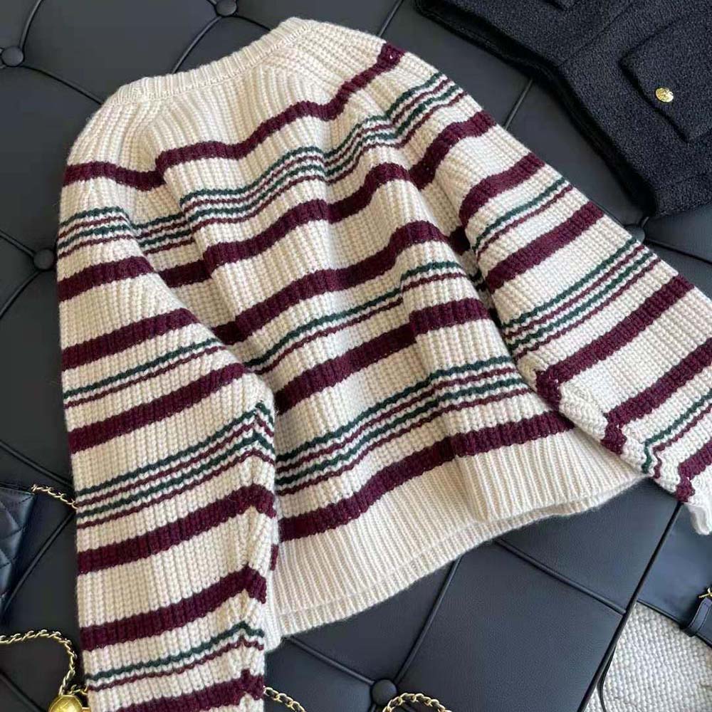 Side angle showing silhouette of Celine Women Crew Neck Sweater in beige