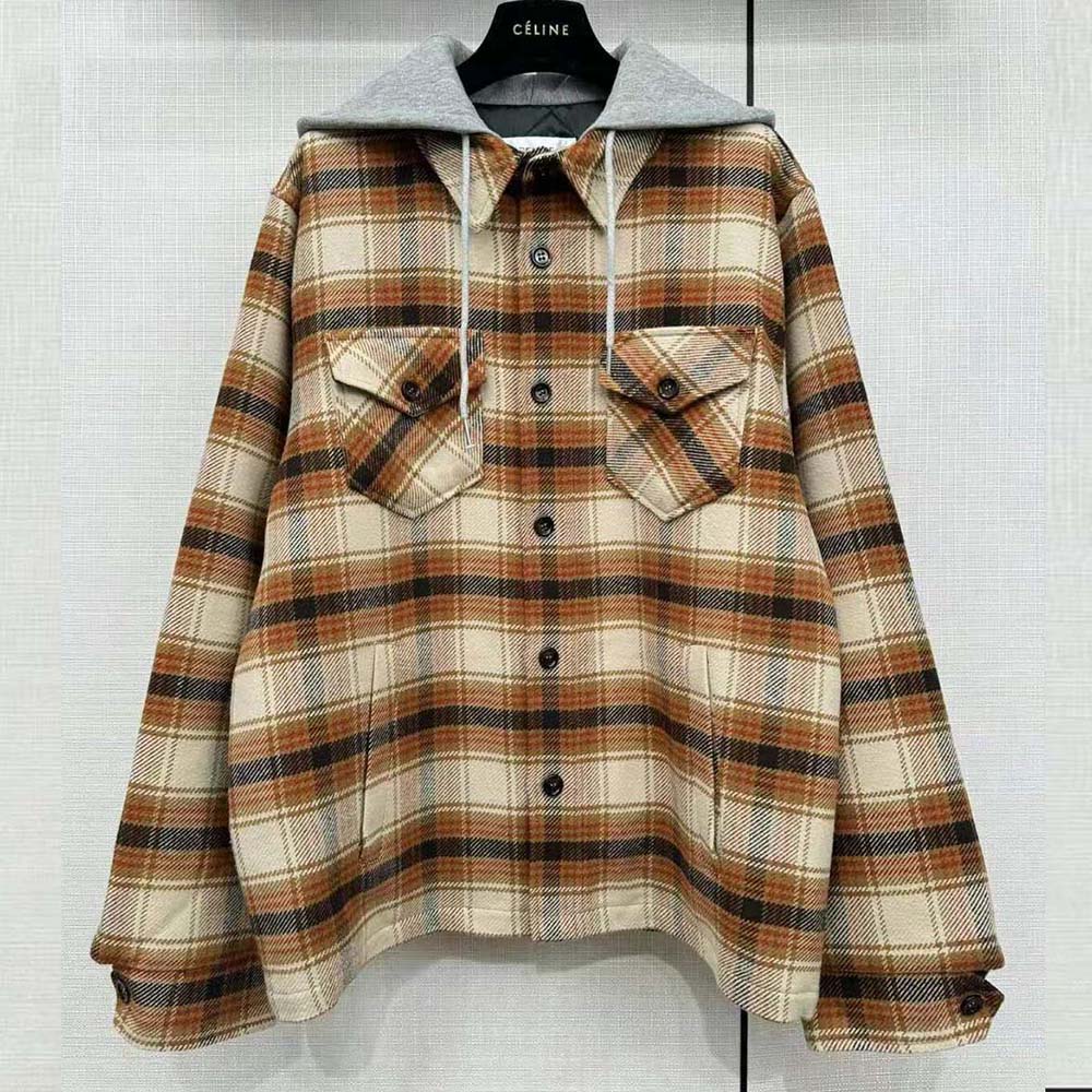 Close-up of checked wool texture and Celine logo buttons on overshirt