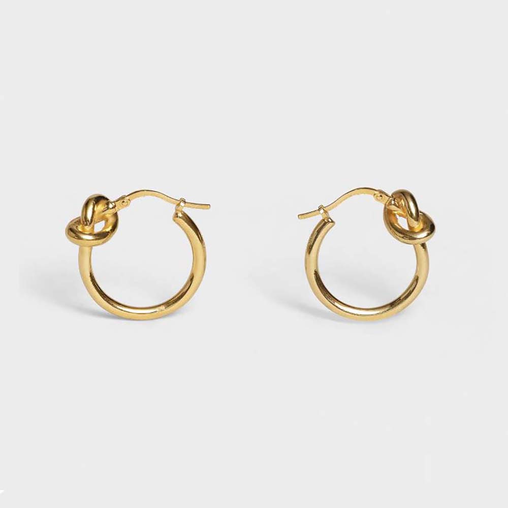 Front view of Celine Women Knot Small Hoops in gold finish