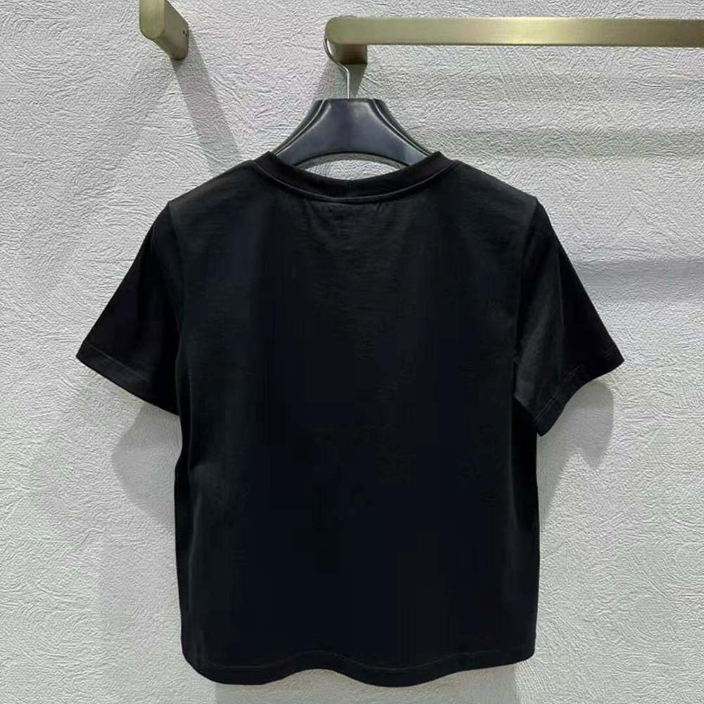Side angle showing relaxed boxy silhouette of Celine Men Paris T-shirt