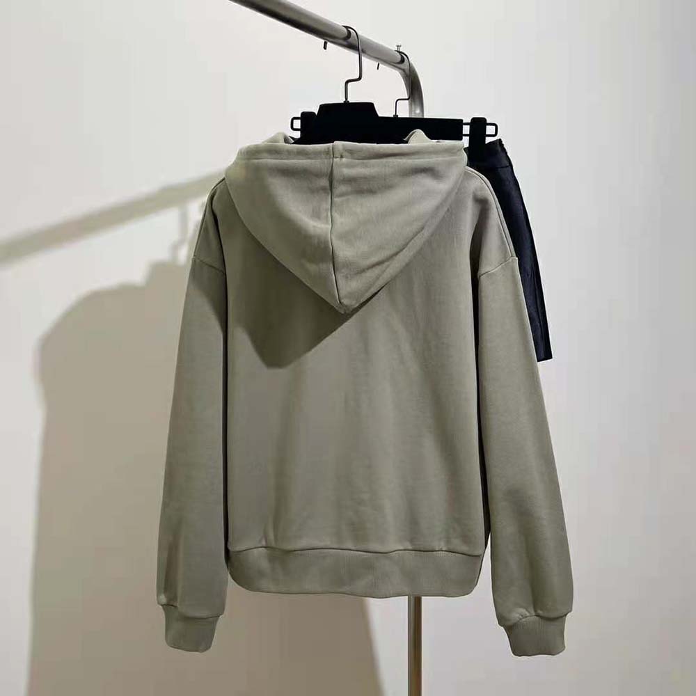 Side angle showing loose fit of Celine Men Paris Loose Hoodie