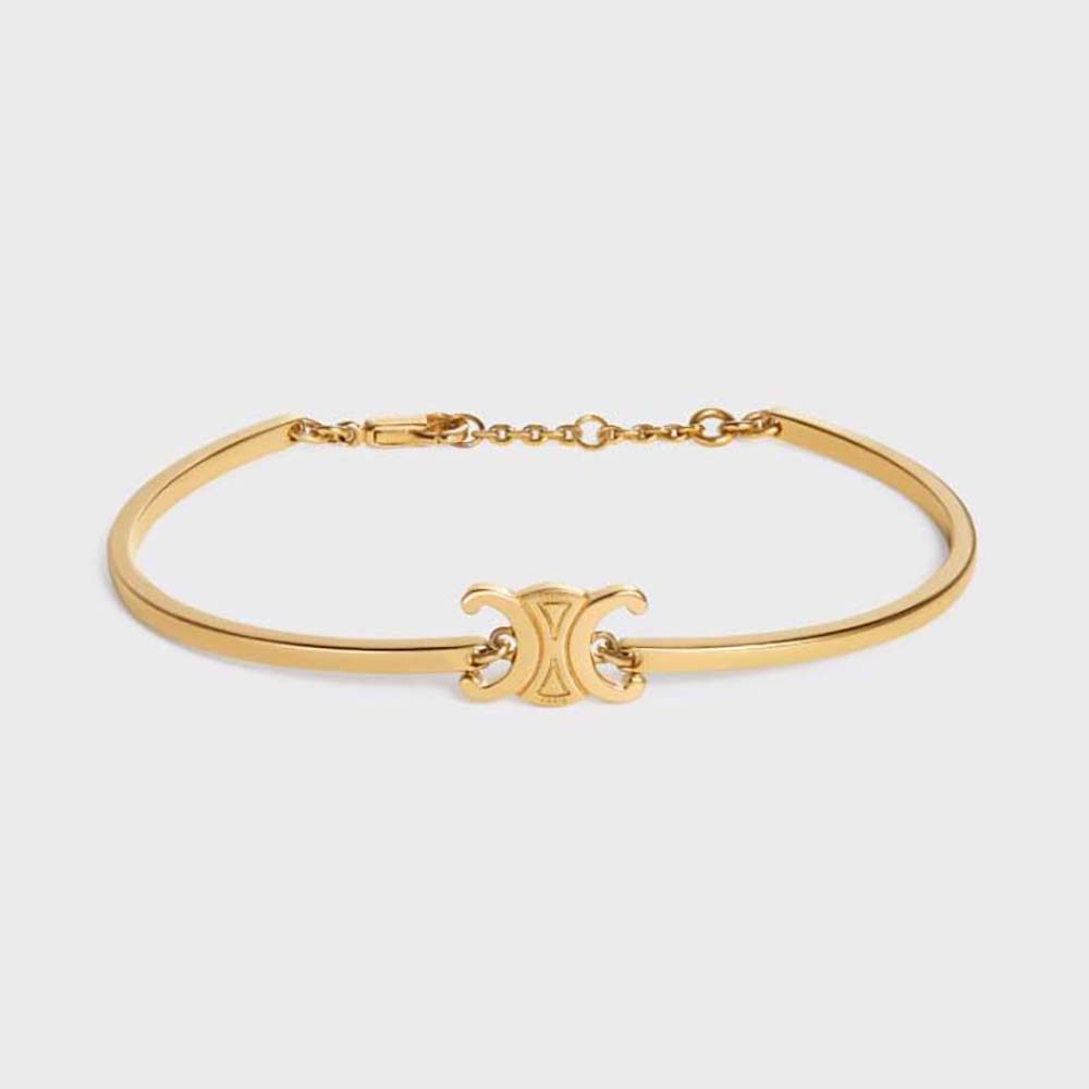 Close-up of Celine Women Triomphe Articulated Bracelet gold finish and clasp