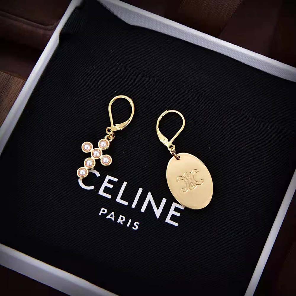 Celine Women Triomphe Folk Earrings worn with elegant outfit, showcasing signature motif