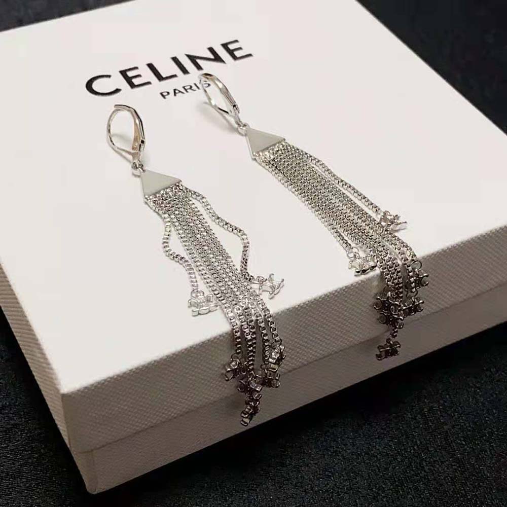 Side angle showing silhouette of Celine Women Triomphe Folk Fringe Earrings