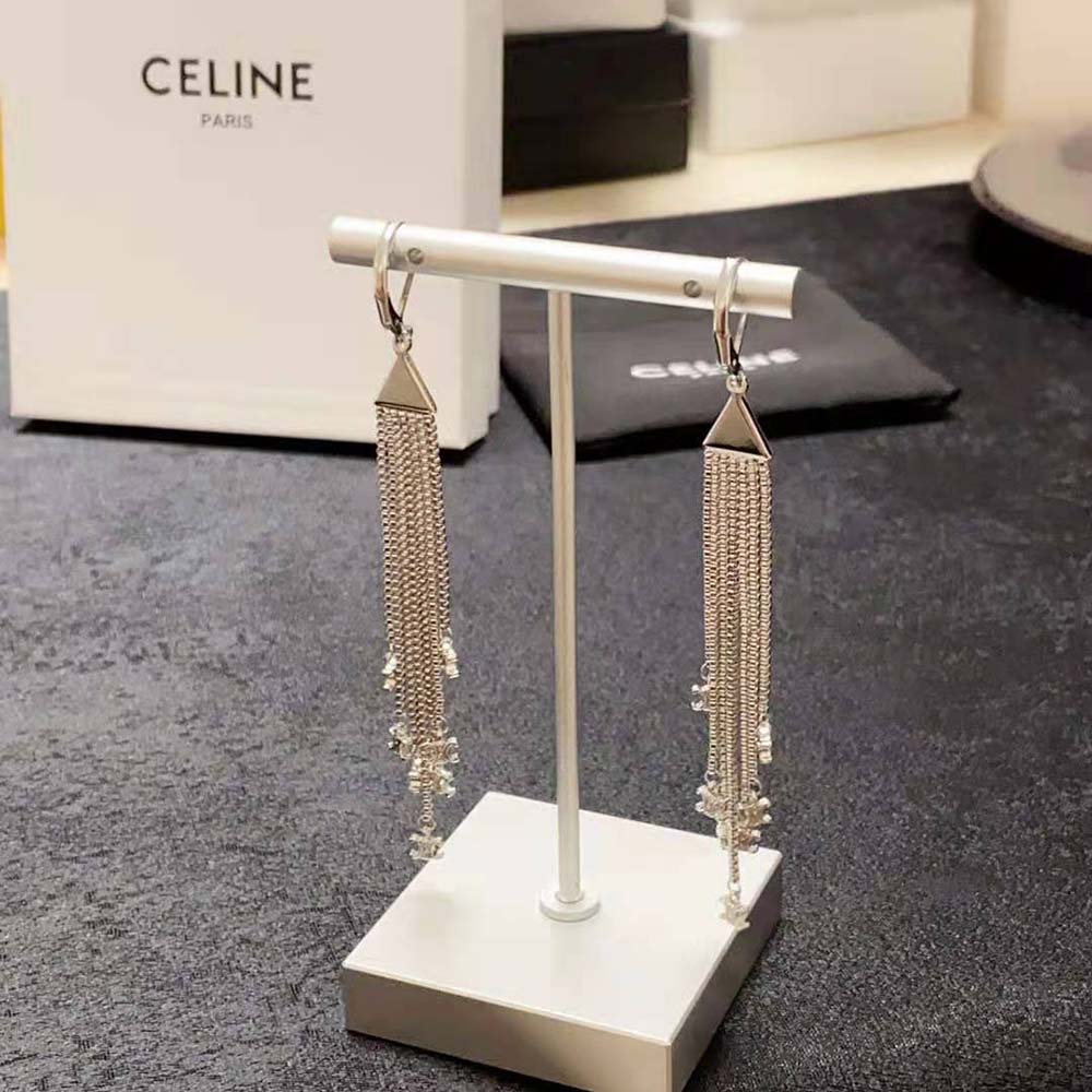 Close-up of rhodium finish and fringe detail on Celine earrings