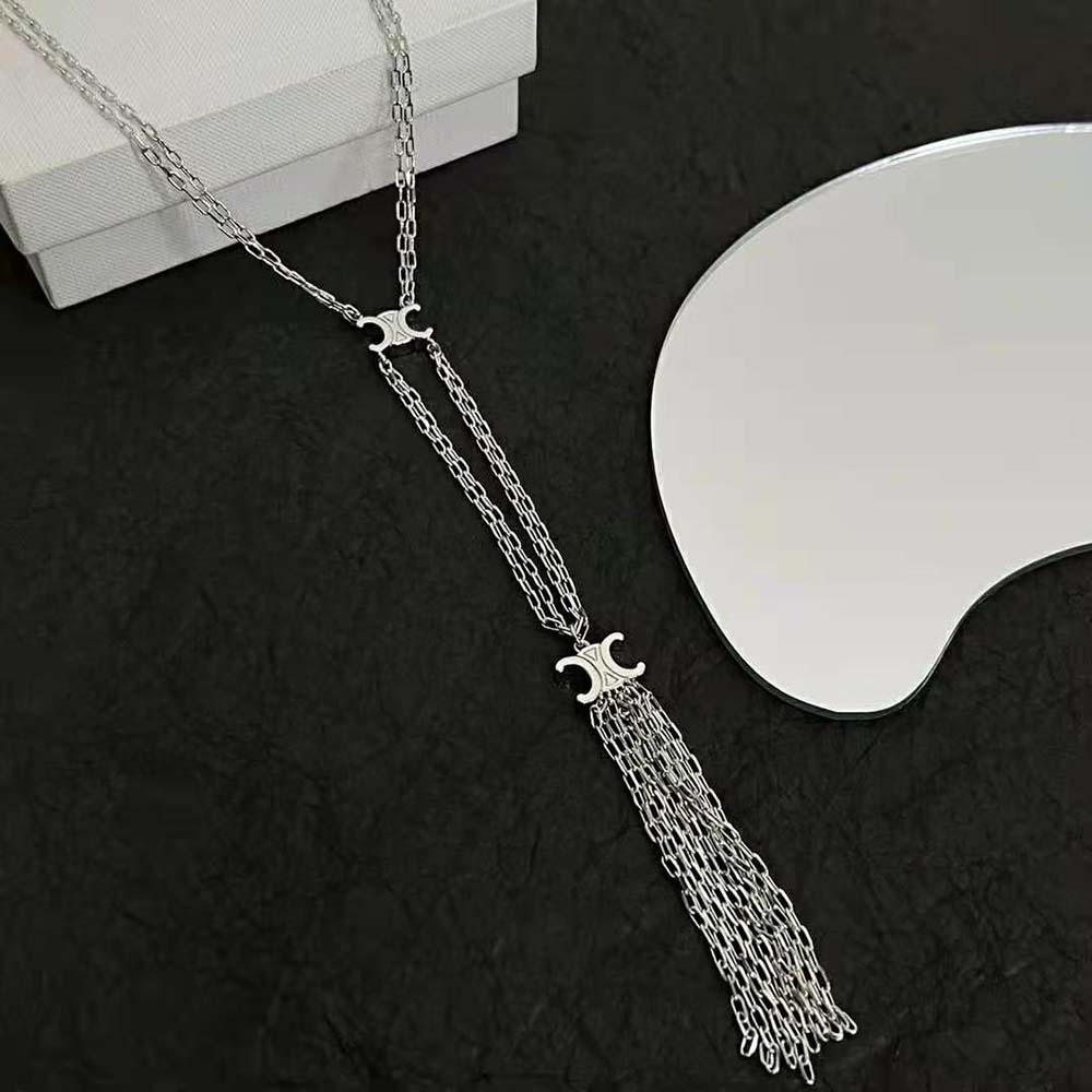 Styled shot of Celine Women Triomphe Folk Tie Long Necklace on model