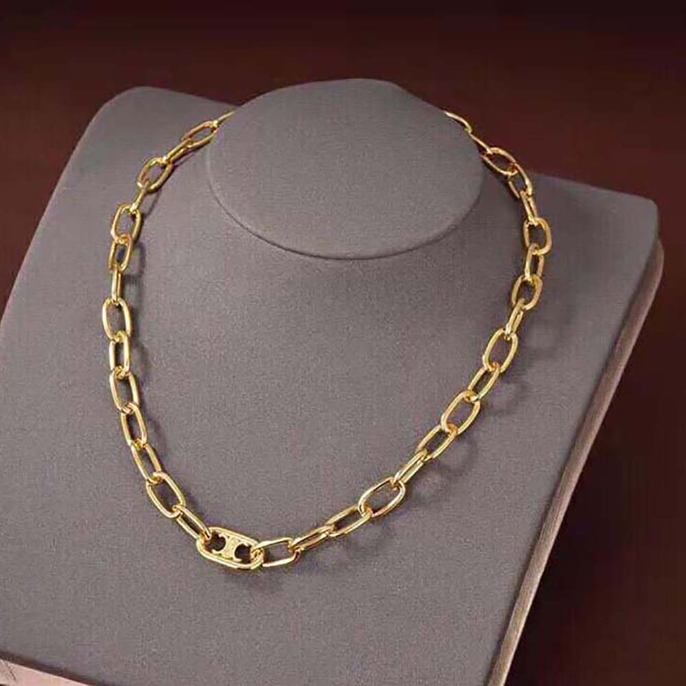 Side angle showcasing Celine Women Triomphe Link Necklace polished brass links