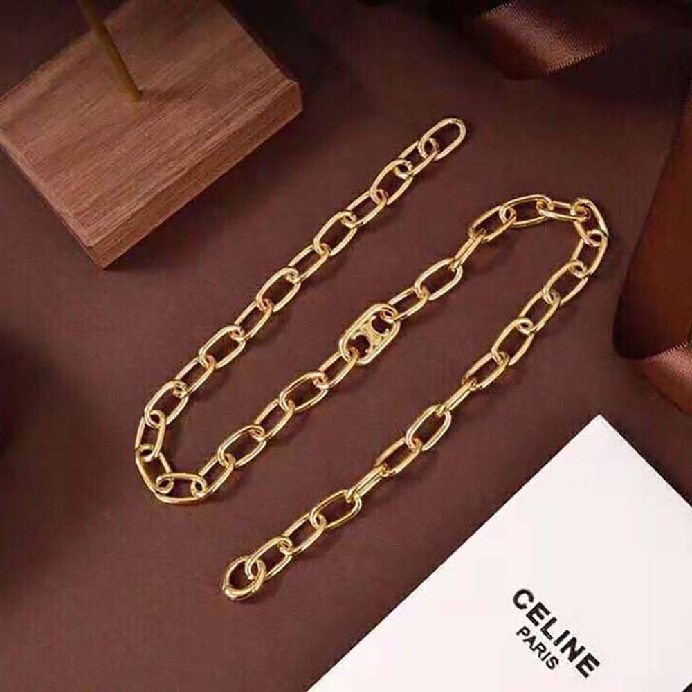 Styled look of Celine Women Triomphe Link Necklace on model’s neckline