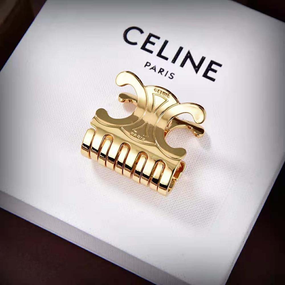 Close-up on the Triomphe hardware detail of Celine hair claw