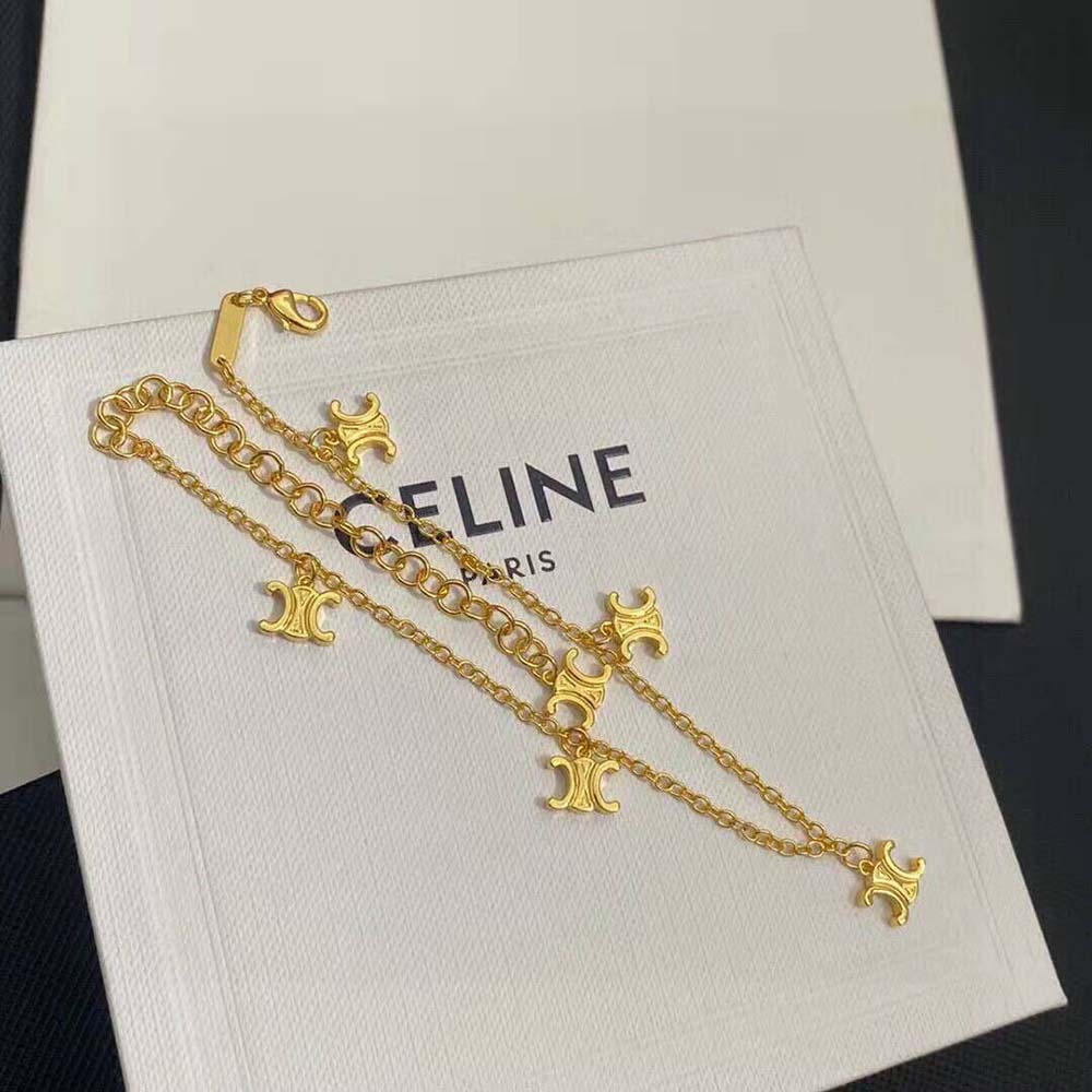 Styled wrist wearing Celine Women Triomphe Mini Triomphe Bracelet