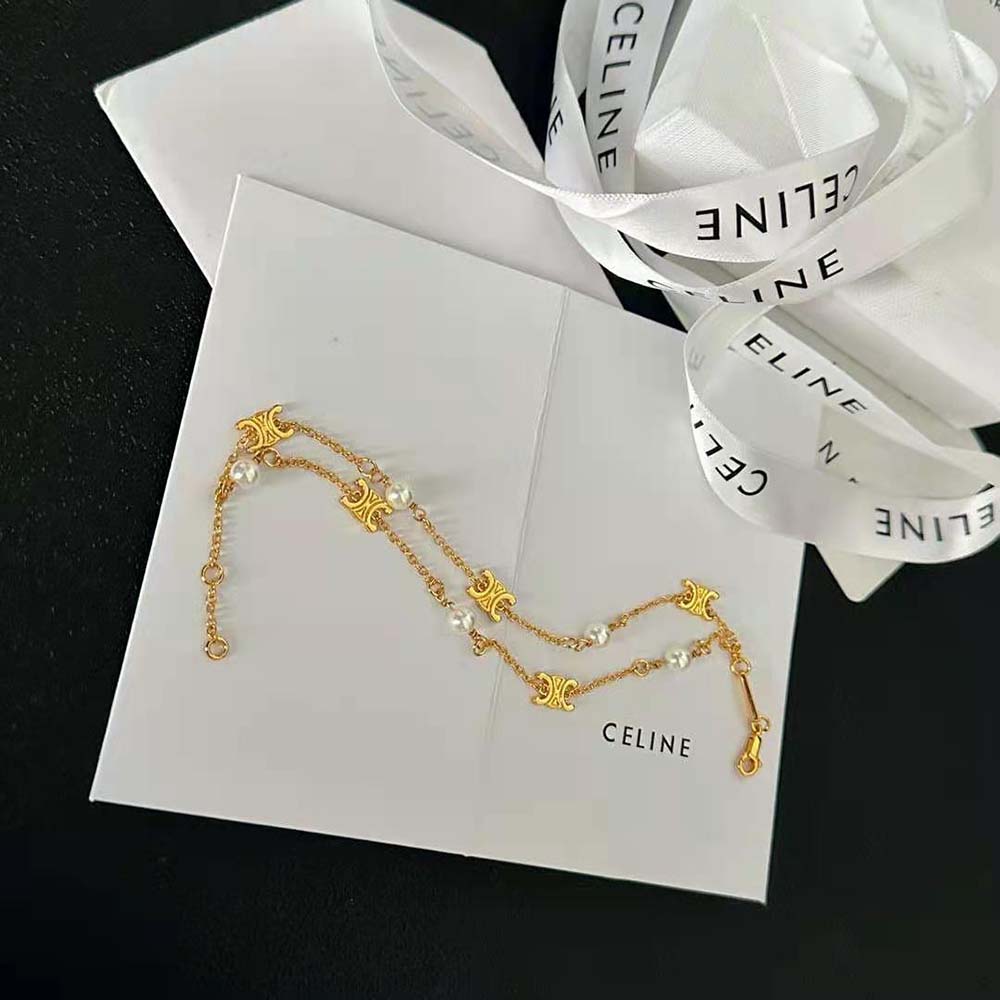 Side angle showing double bracelet silhouette of Celine Women Triomphe Pearl Double Bracelet