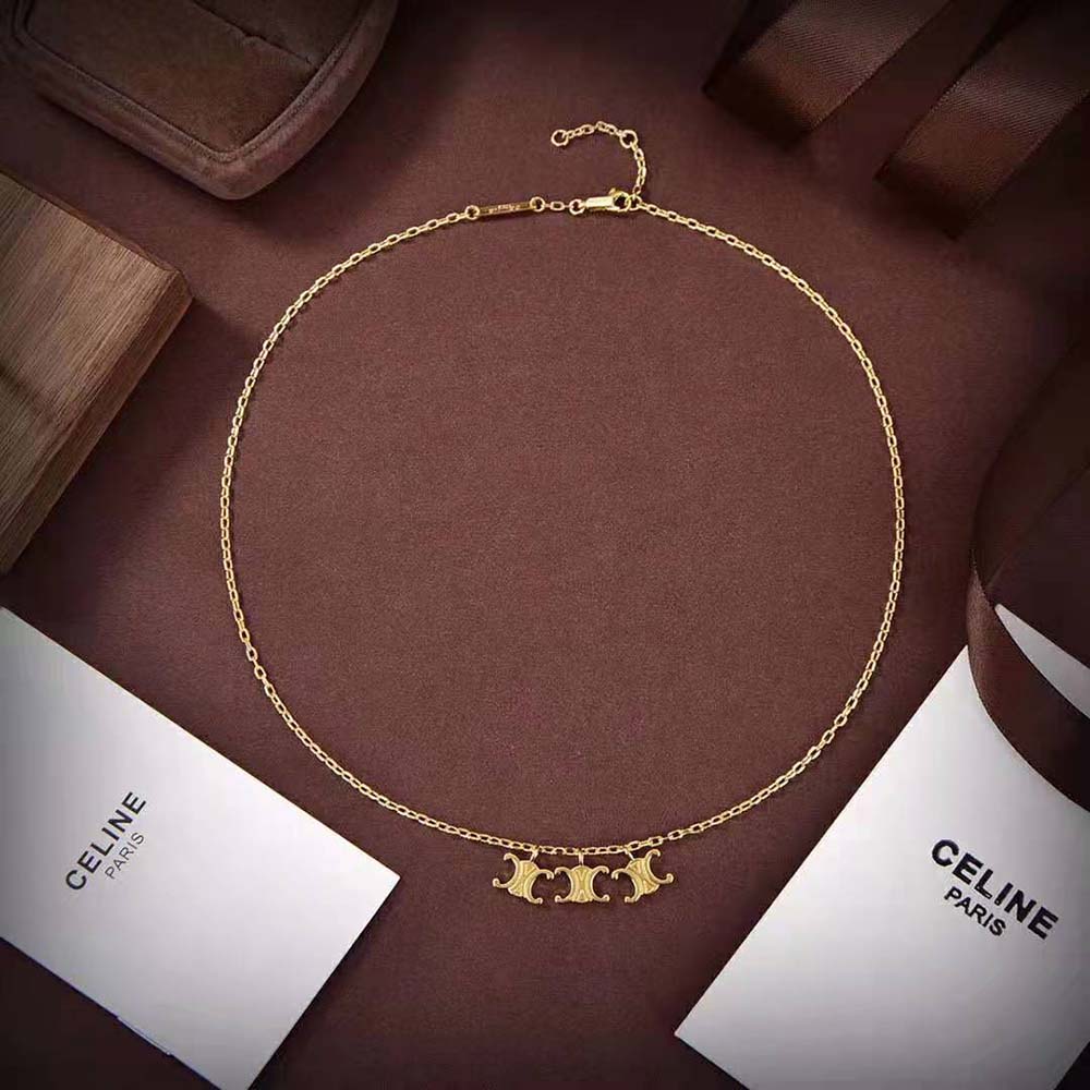 Close-up detail of triomphe motif on Celine Women Triomphe Trio Necklace