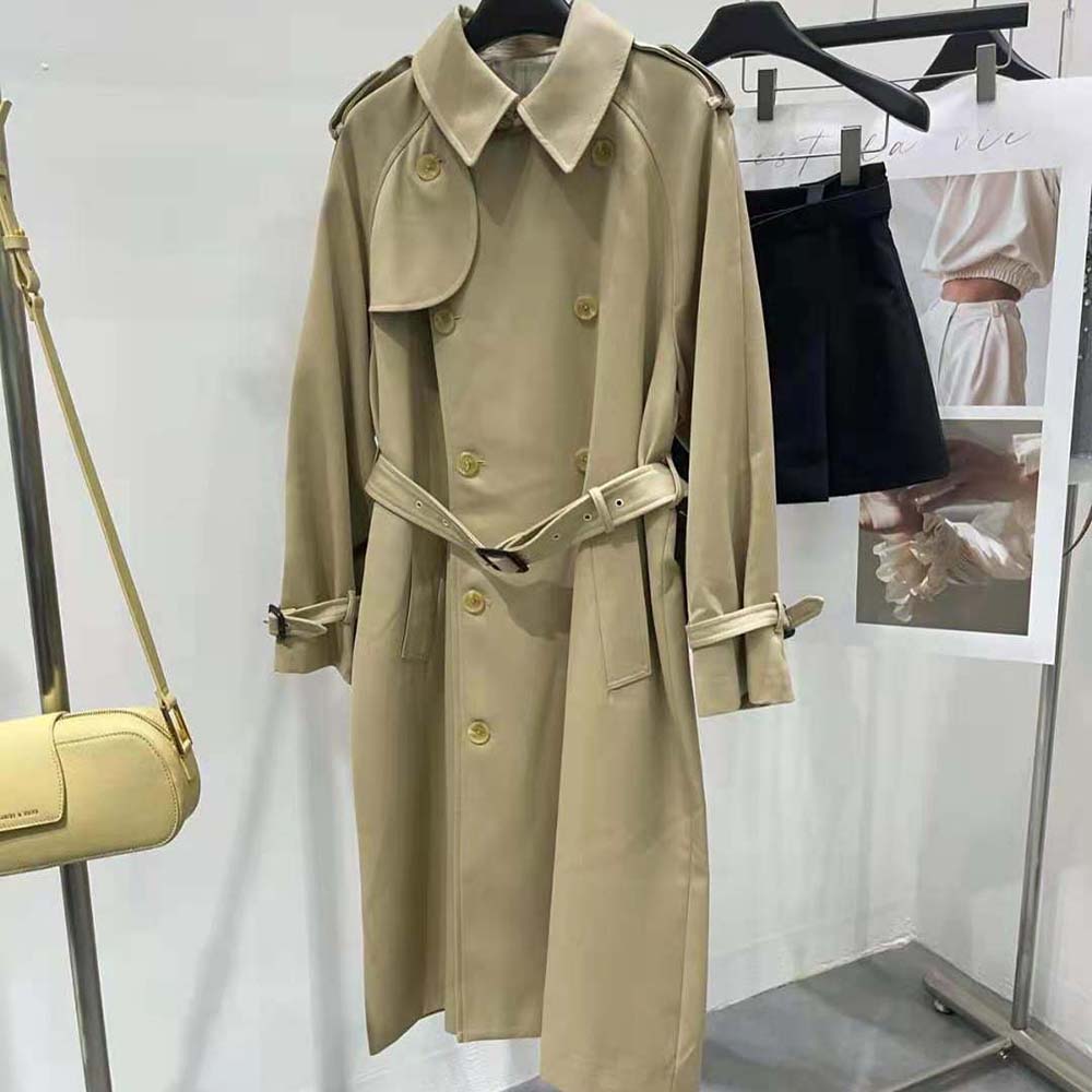 Close-up of signature lapels and branded buttons on Celine Men Wiltern Trench Coat