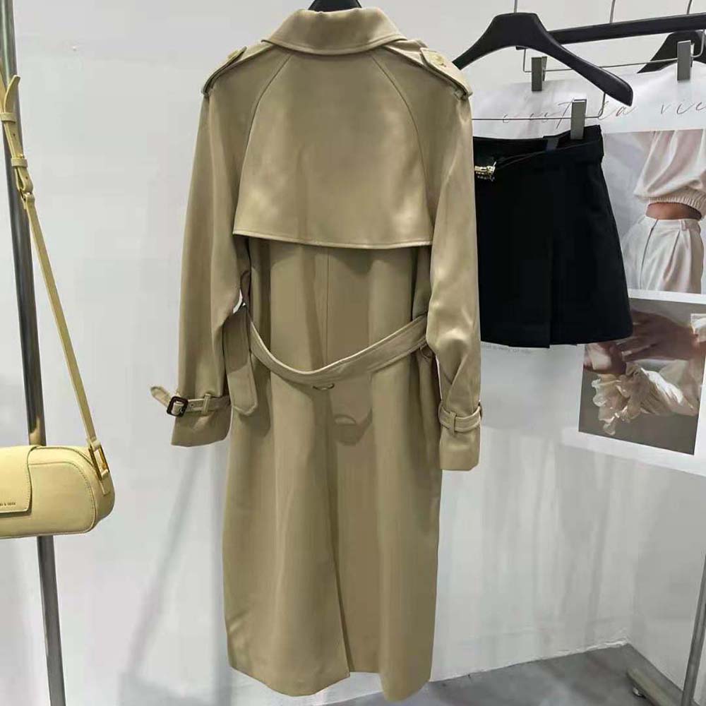 Side profile showing silhouette and belt detail of Celine Men Wiltern Trench Coat