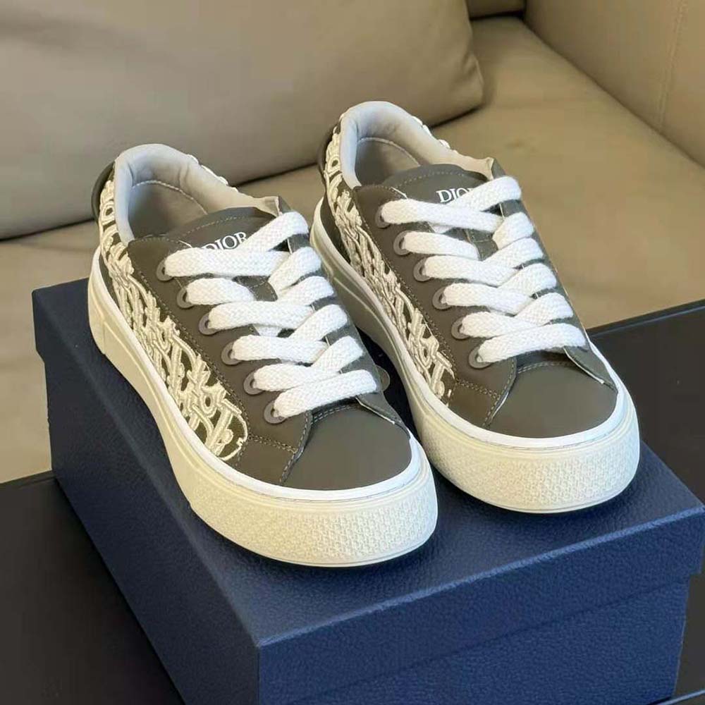 Close-up of signature hardware on Dior Men B33 Sneaker