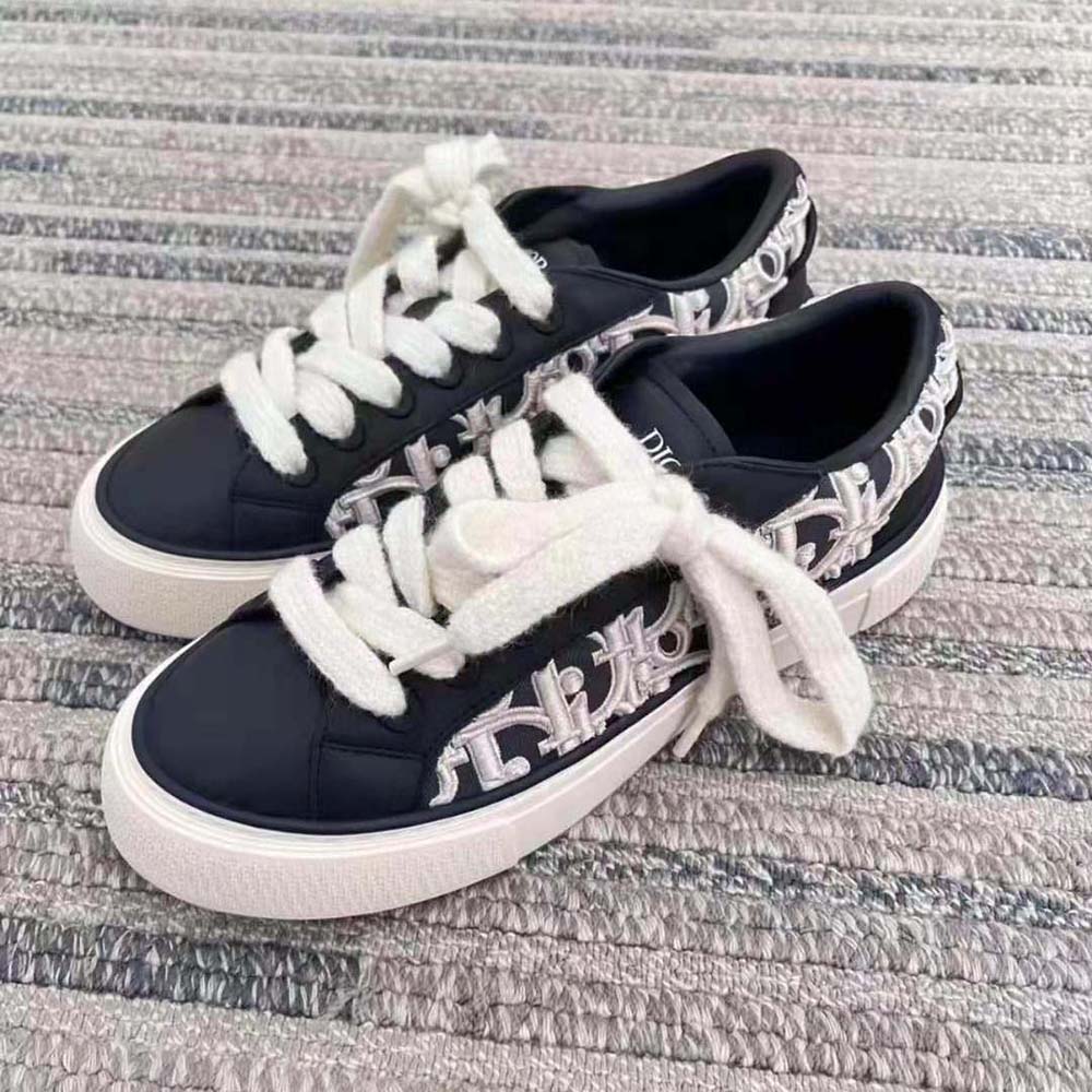 Side profile showing sleek silhouette of Dior Men B33 Sneaker navy edition