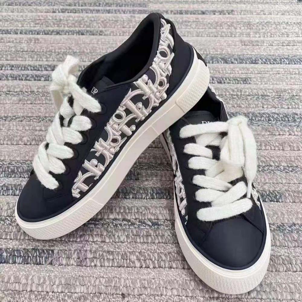 Close-up of lace-up closure and Dior embossing on Dior Men B33 Sneaker