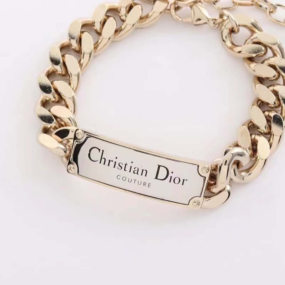 Dior Men Christian Dior Couture Chain Link Bracelet worn on wrist showcasing gold and silver finish