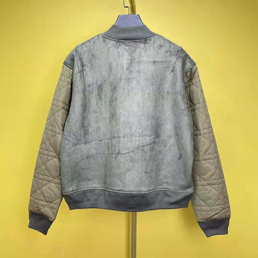 Side profile showing silhouette of Dior Men Zipped Varsity Blouson