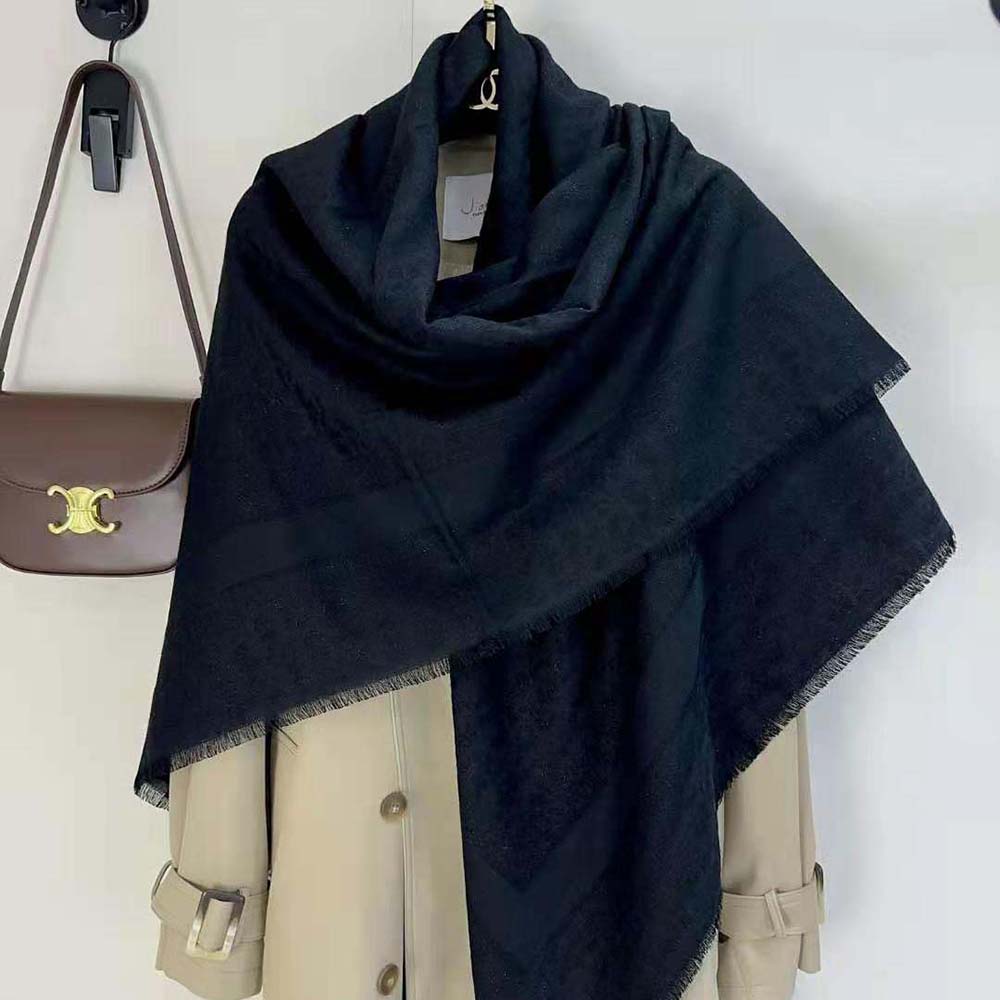 Close-up of Dior Oblique pattern on black silk blend shawl