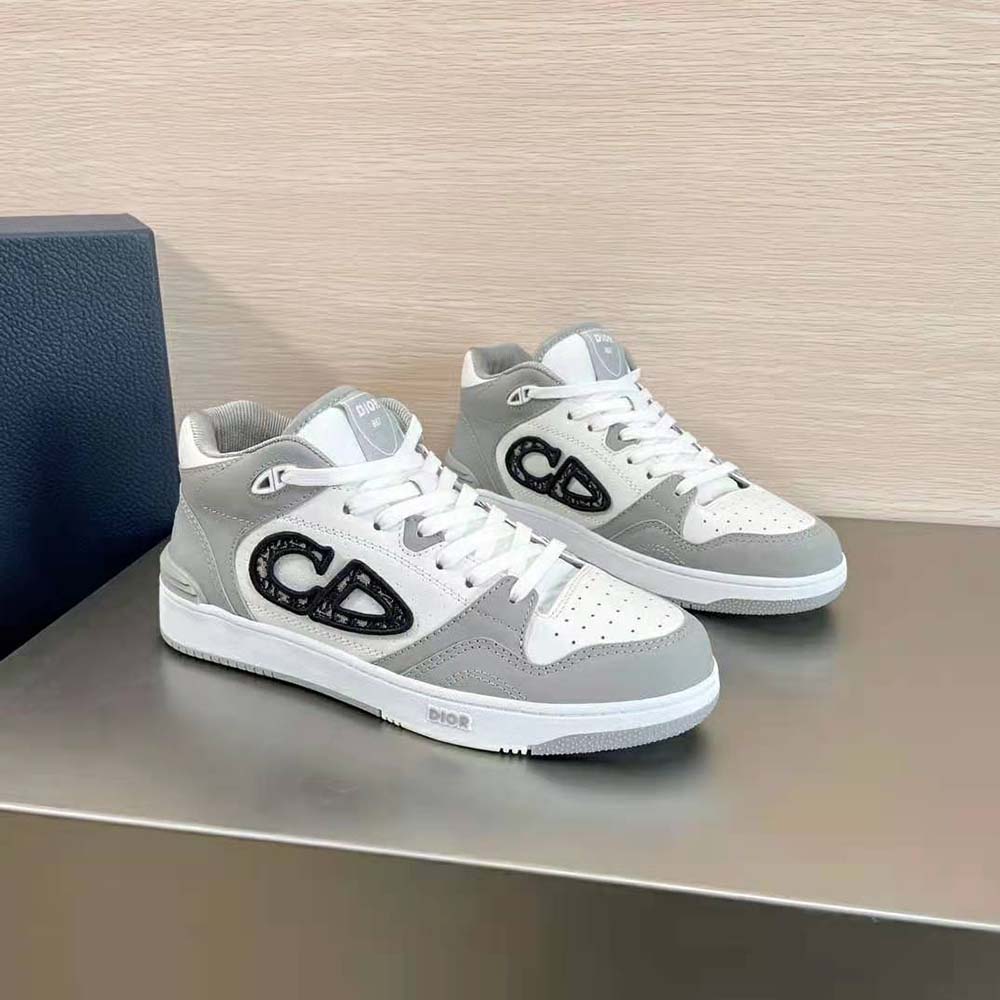 Top angle showing gray and white smooth calfskin on Dior Men B57 Sneaker