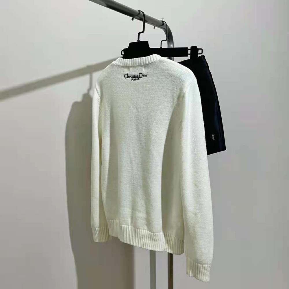 Side angle showing relaxed silhouette of Dior Women Embroidered Sweater ecru knit