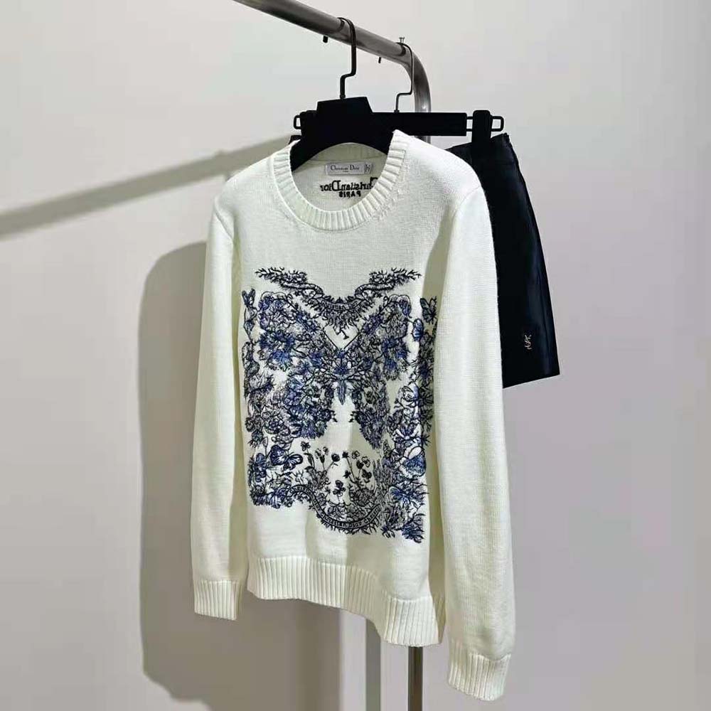 Close-up of pastel midnight blue butterfly embroidery on Dior Women Embroidered Sweater