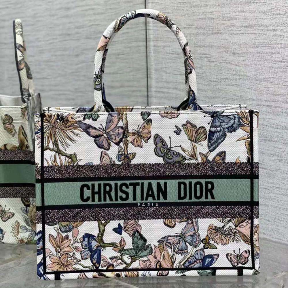 Close-up of vibrant multicolor Mexican embroidery on Dior Book Tote canvas