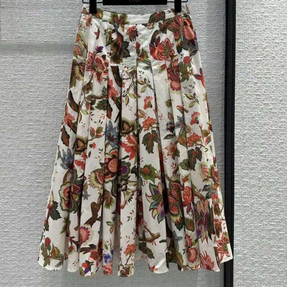 Close-up detail of Albero Della Vita motif on Dior pleated skirt