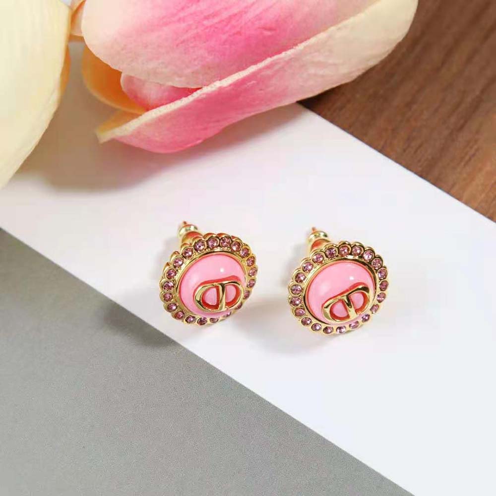 Dior Women Petit CD Stud Earrings worn on model’s earlobe, elegant shine