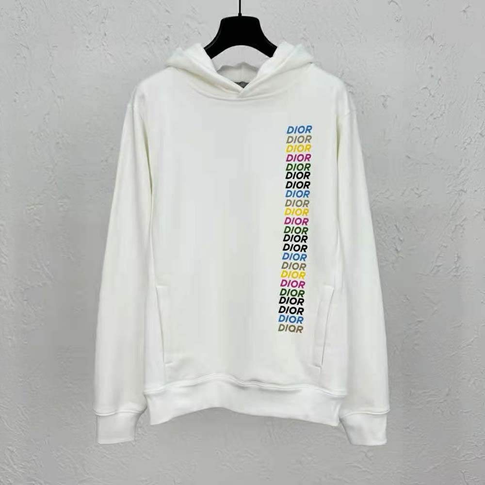 Close-up of Dior logo detail on white cotton fleece sweatshirt