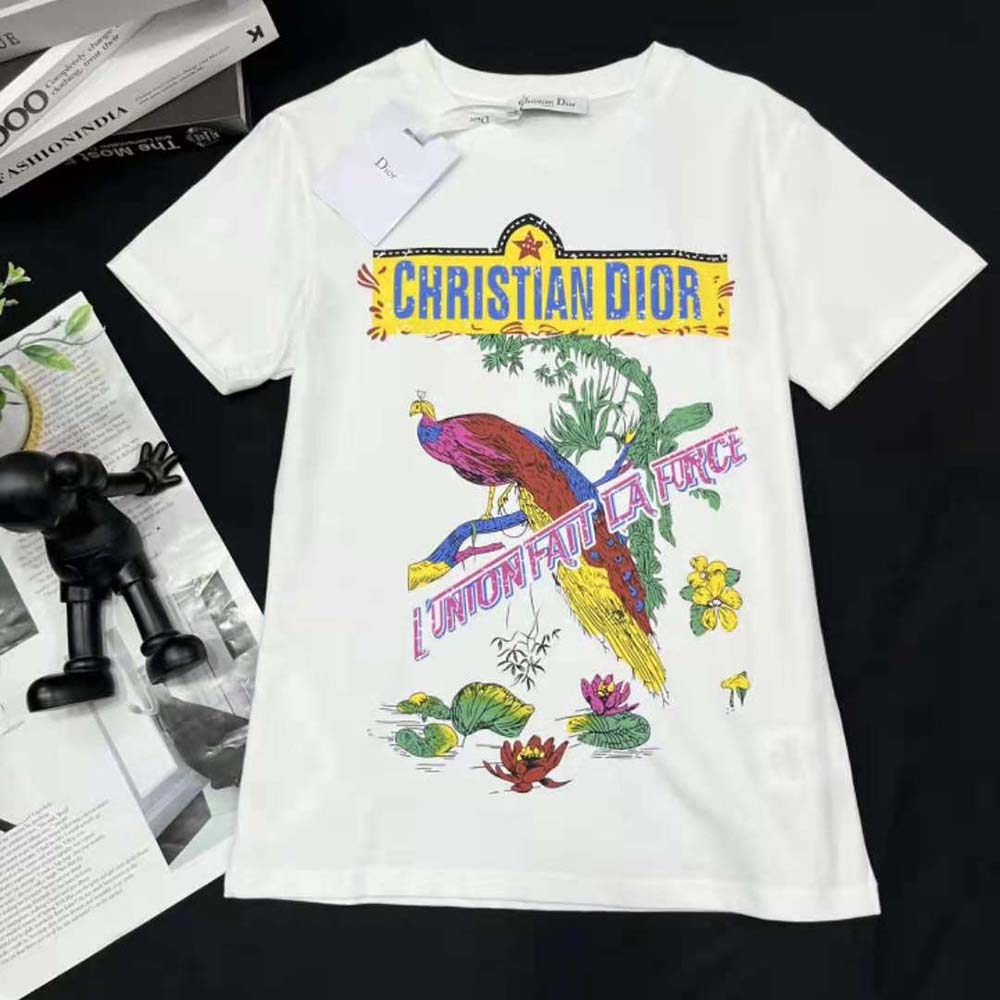 Close-up detail of multicolor peacock print on Dior Men T-shirt