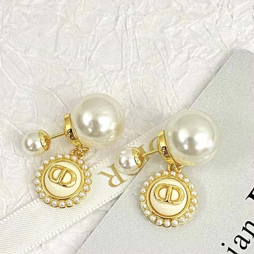 Close-up of white resin pearls and latte glass on Dior Women Tribales Earrings