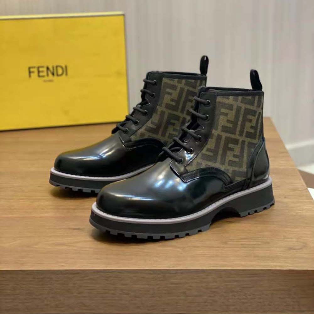 Top-down angle displaying lacing and leather texture on Fendi biker boots