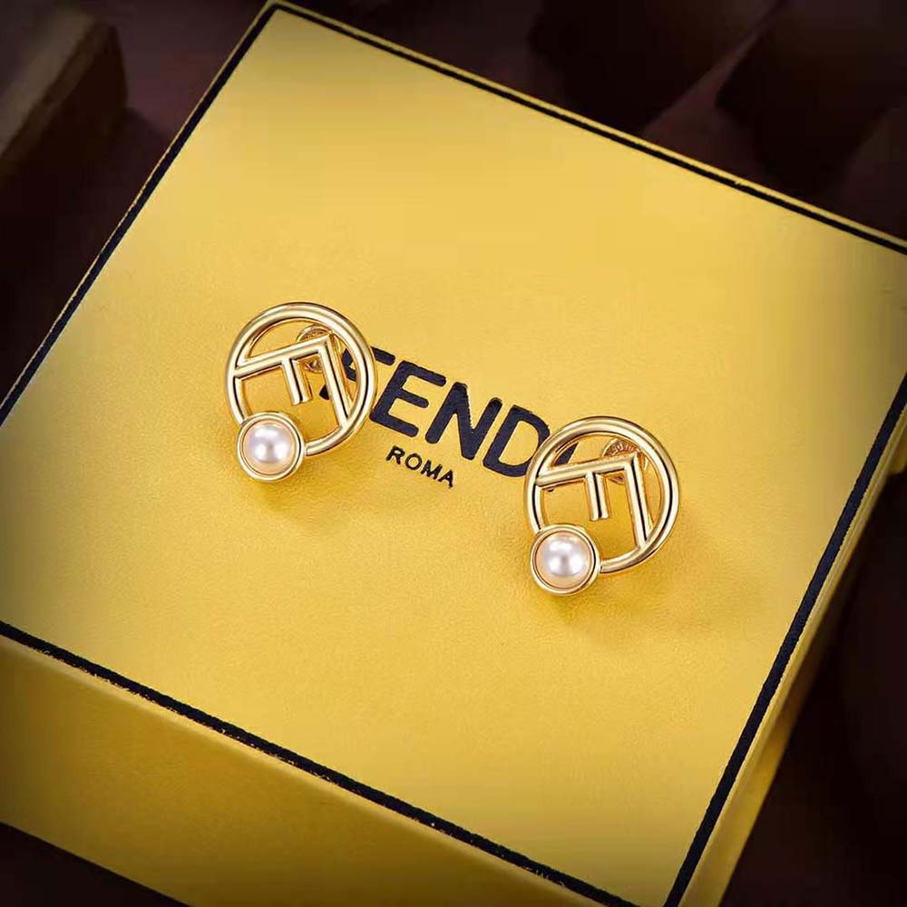 Side view of Fendi Women F is Fendi Earrings Gold-colored Metal highlighting smooth finish