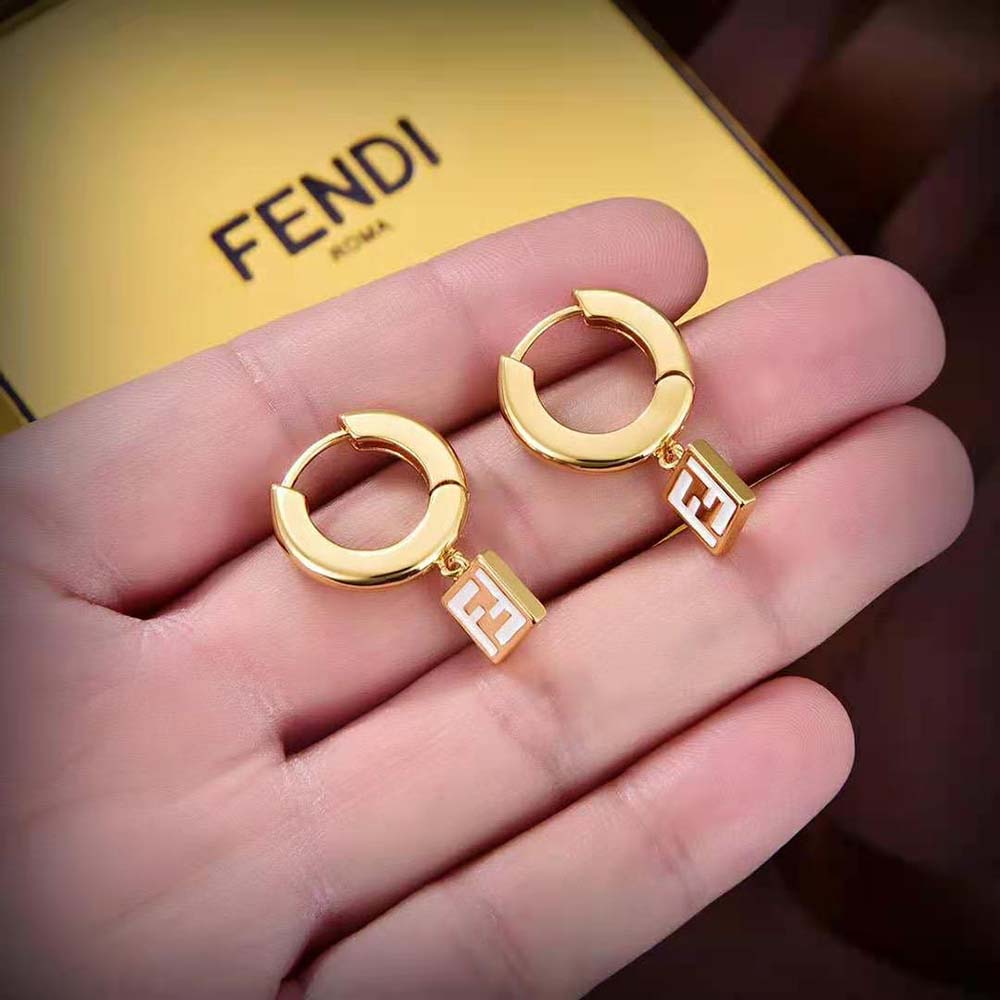 Side angle showing drop silhouette and push-back closure of Fendi Women Forever Fendi Earrings