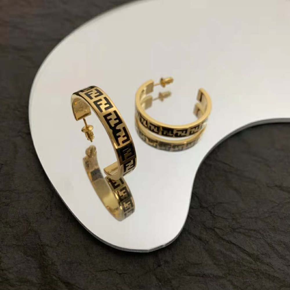 Side angle showing push-back closure on Fendi Women Forever earrings