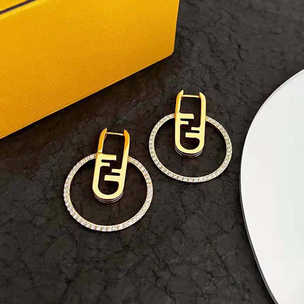 Side angle of Fendi Women O’Lock Earrings Gold-coloured highlighting silhouette