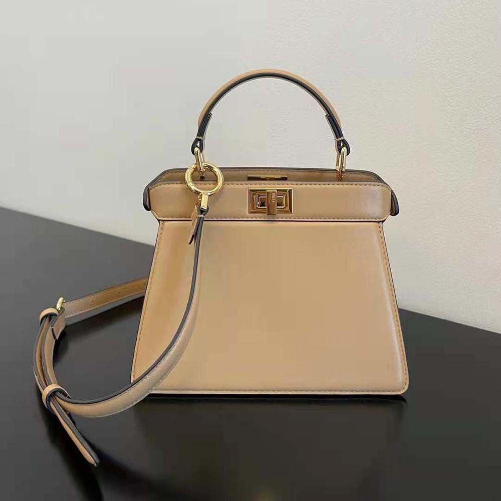 Close-up of gold-tone hardware on Fendi Women Peekaboo ISeeU Petite Beige bag