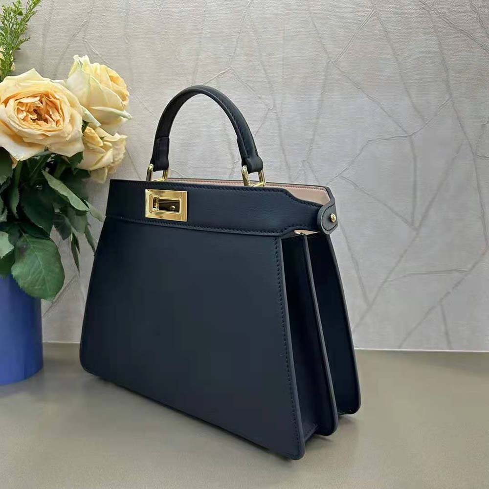Side angle showing padded silhouette of Fendi Women Peekaboo ISeeU Bag
