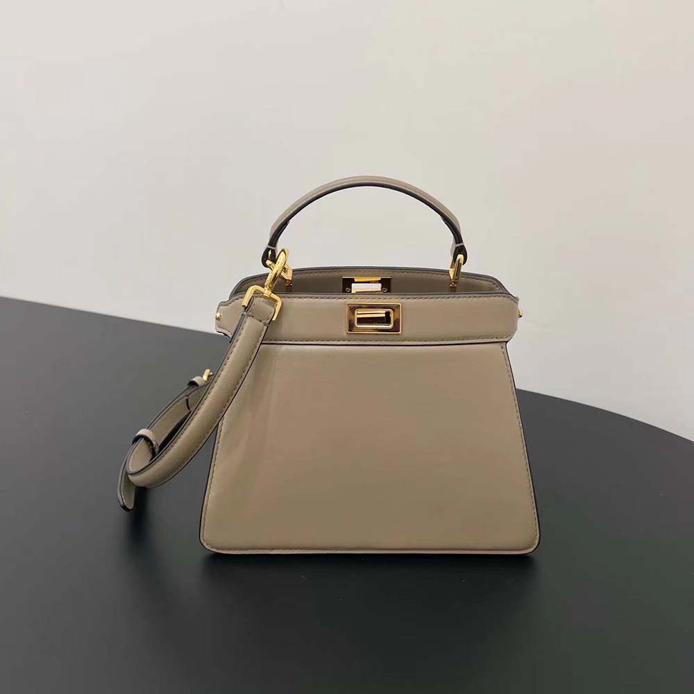 Close-up of gold hardware on Fendi Women Peekaboo ISeeU Petite Light Gray bag