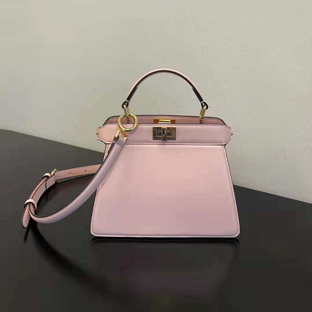 Side angle showing padded pink nappa leather and strap on Fendi Peekaboo ISeeU Petite