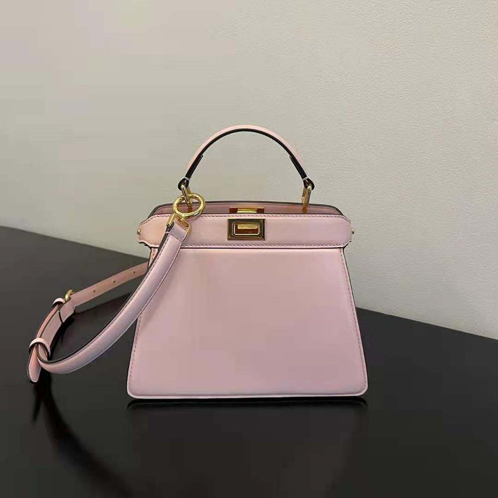 Close-up of gold-tone push-lock closure on Fendi Peekaboo ISeeU Petite bag