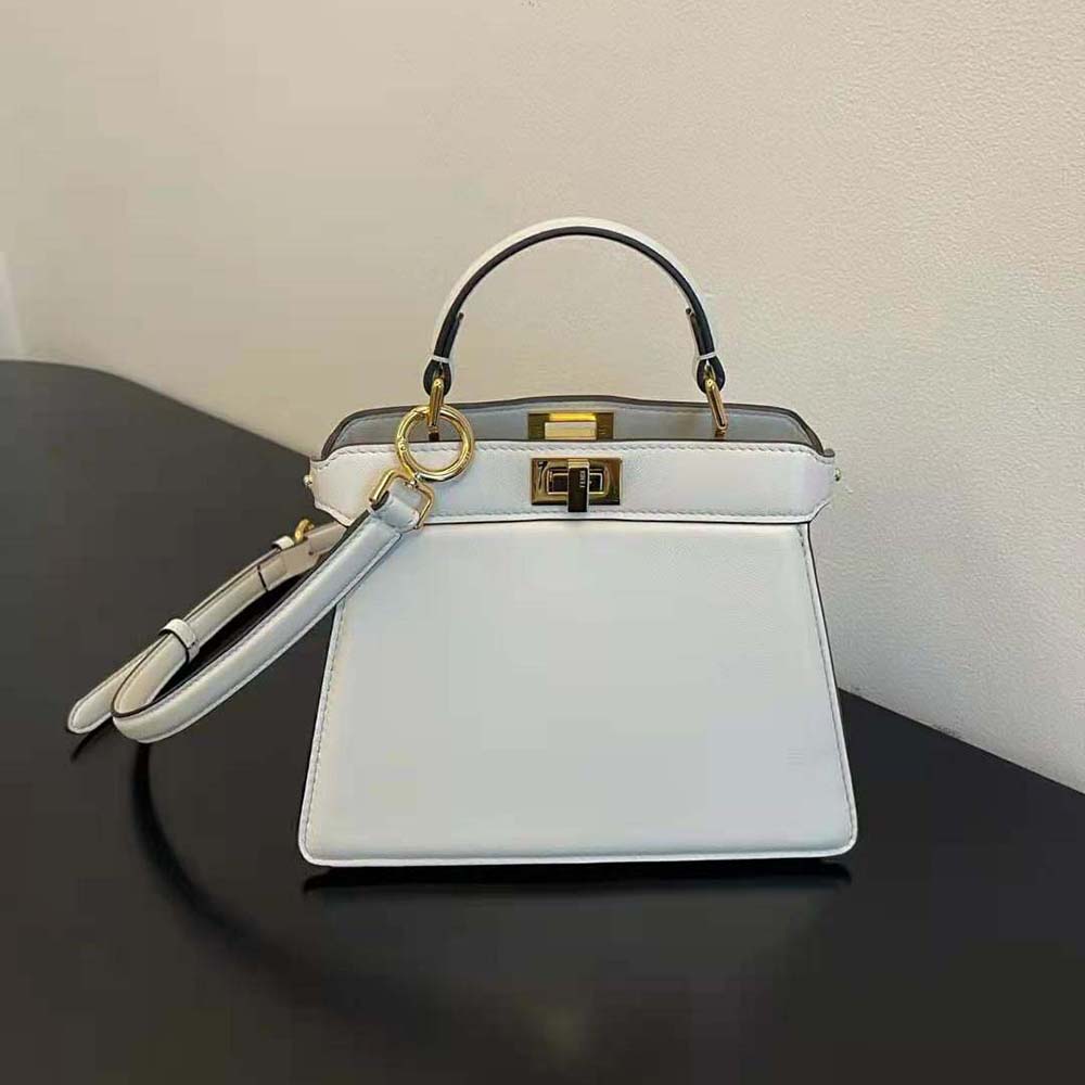 Close-up on gold-tone hardware and padded leather of Fendi Peekaboo bag