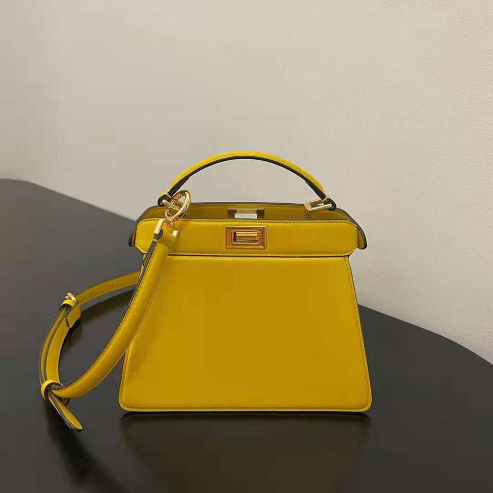 Side angle showing padded texture of Fendi Peekaboo ISeeU Petite Yellow Leather Bag