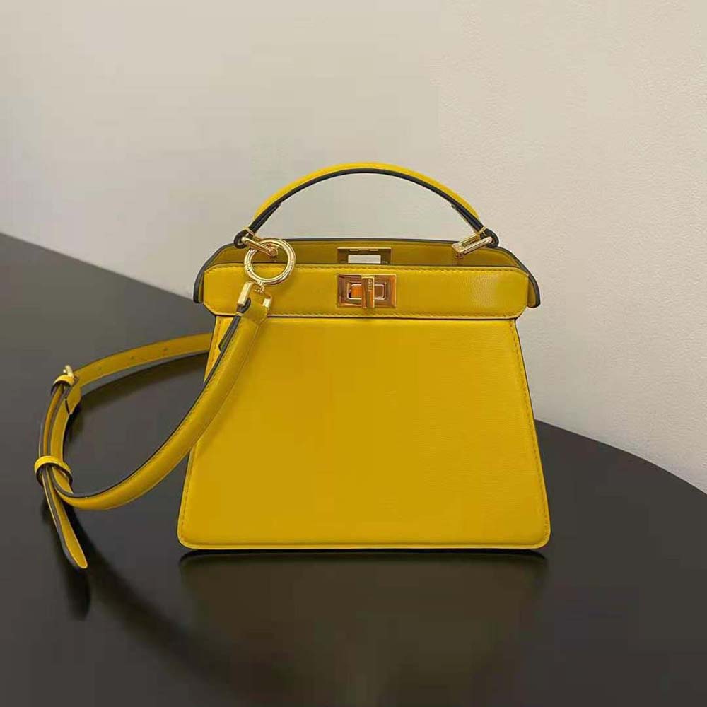 Close-up of gold-tone hardware on Fendi Peekaboo ISeeU Petite Yellow bag