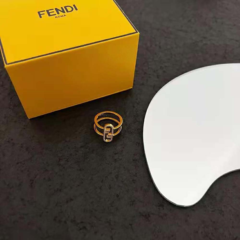 Side angle showing smooth wide band of Fendi Women Wide-band Ring