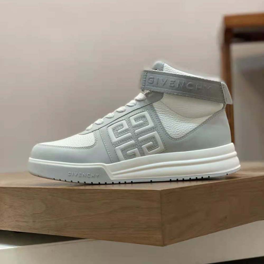 Overhead shot showing white sole and leather texture of Givenchy Men G4 sneakers