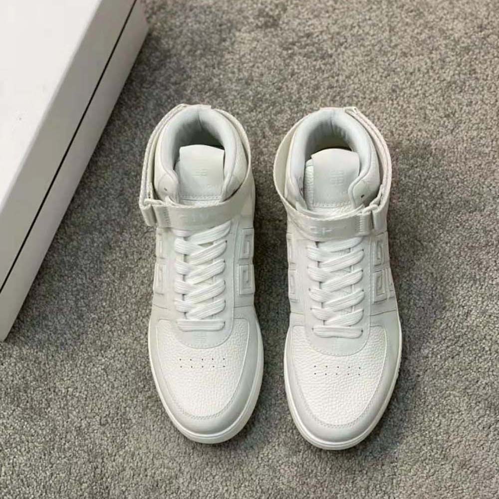 Close-up detail of embossed logo on Givenchy Men G4 Sneakers