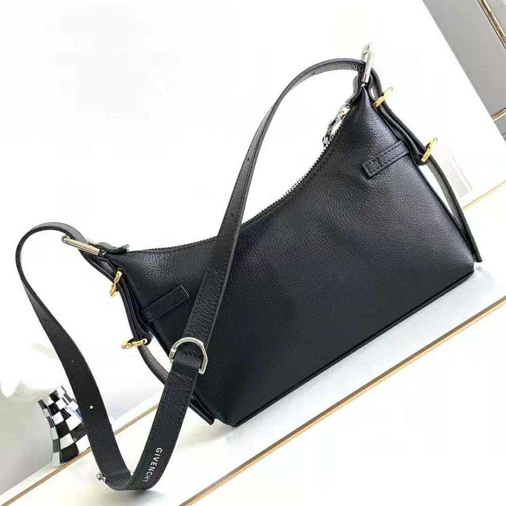 Side angle showing adjustable leather strap on Givenchy Women Mini Voyou Bag